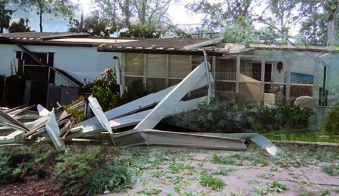 Wind damaged house Wind damaged house