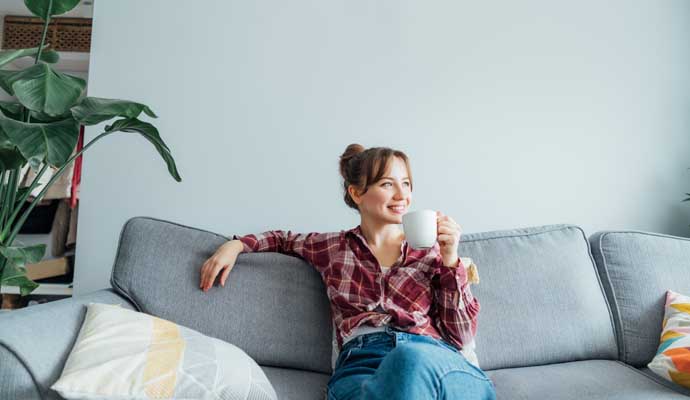 Person relaxing in a clean room