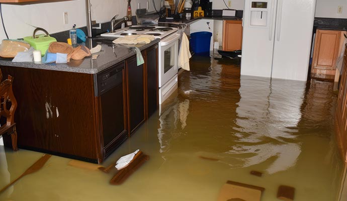 Flash flooding house interior Standing water inside house after heavy flood