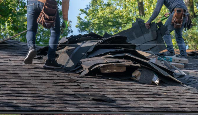 Wind damaged house roof Wind damaged house roof