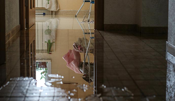 A flooded floor in a room